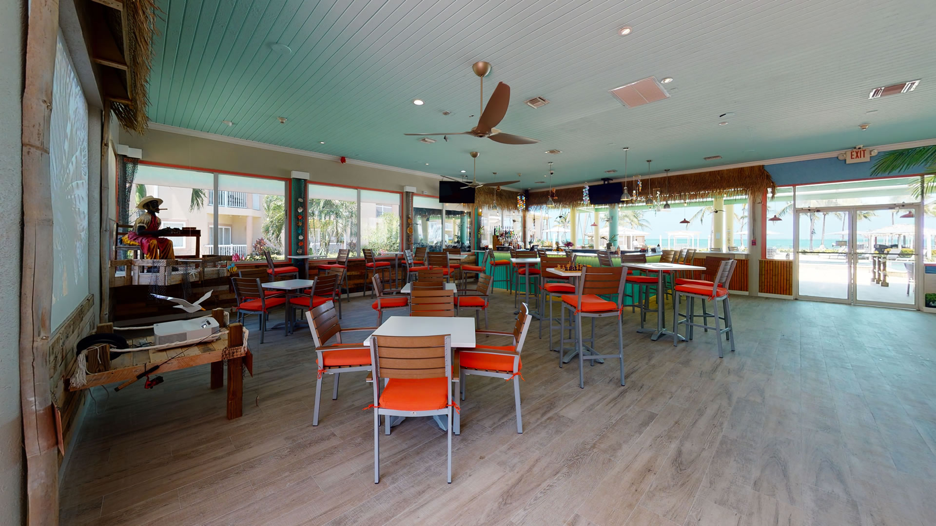 The main dining area within the Driftwood Bar and Grill at the Grand Caymanian Resort.