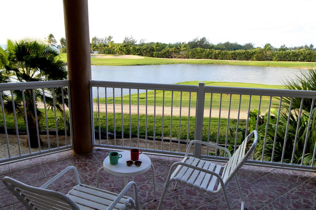 Guest suite patio view of the golf course from the Grand Caymanian Resort.