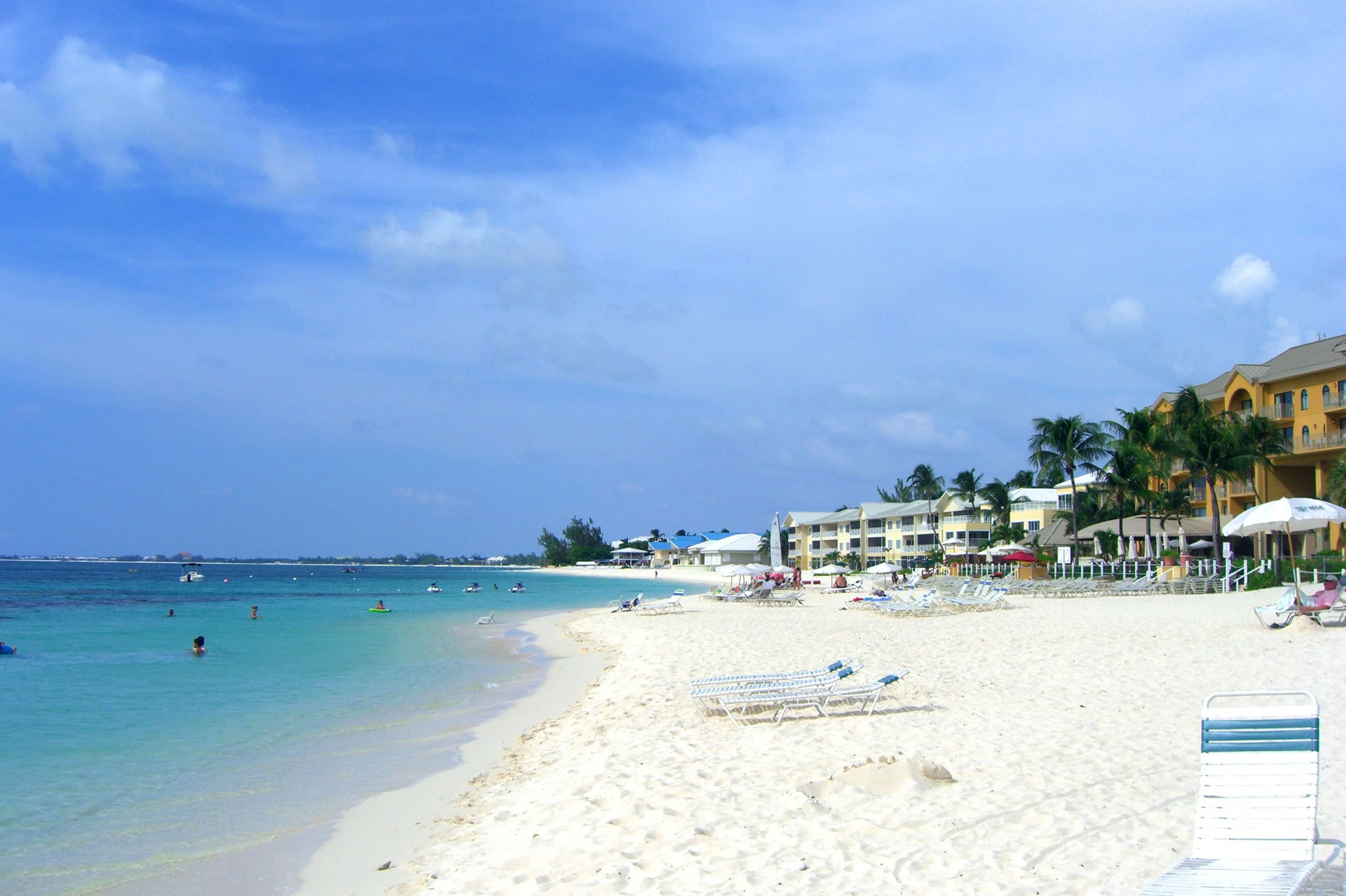 Resorts lining the white sand beaches of Grand Cayman's Seven Mile Beach.